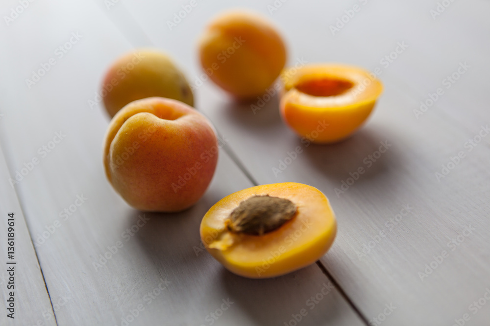 Apricots on table