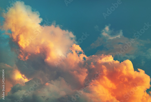 Sky with a fluffy clouds at sunset