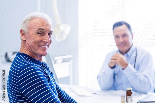 Portrait of senior patient smiling in clinic