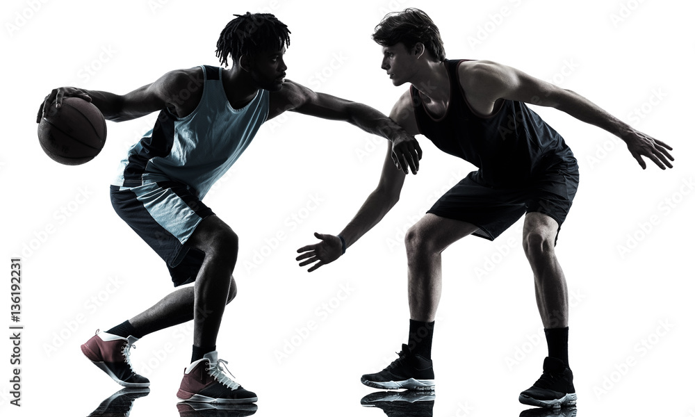 Fototapeta premium two basketball players men isolated in silhouette shadow on white background