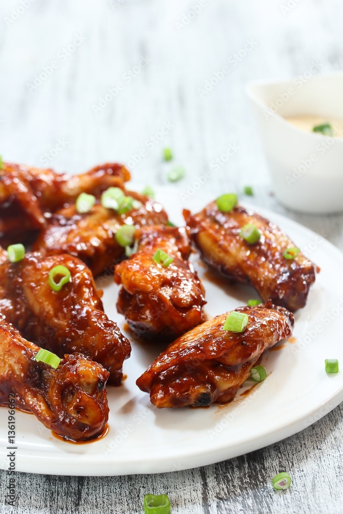 Foto Stock Honey Barbecue glazed chicken wings Adobe Stock
