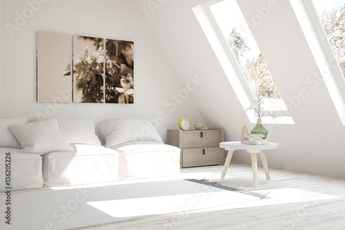 White interior design with sofa and winter landscape in window
