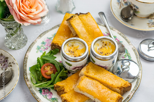 Cheesy coddled eggs photo