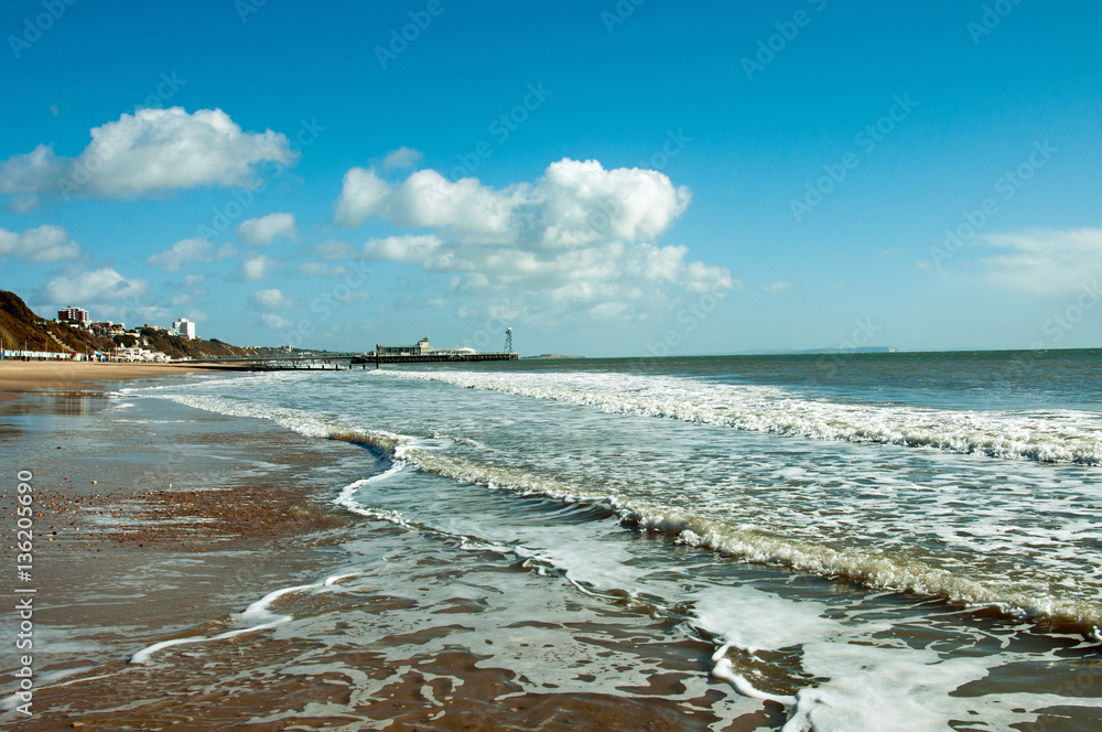 Ocean waves coming in on Bournemouth beach, Dorset, UK.