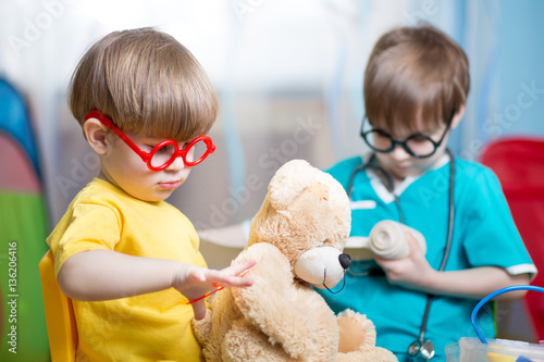 Kids playing doctor and cur...