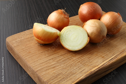 bulbs on a blackboard  Onions on a cutting board oak