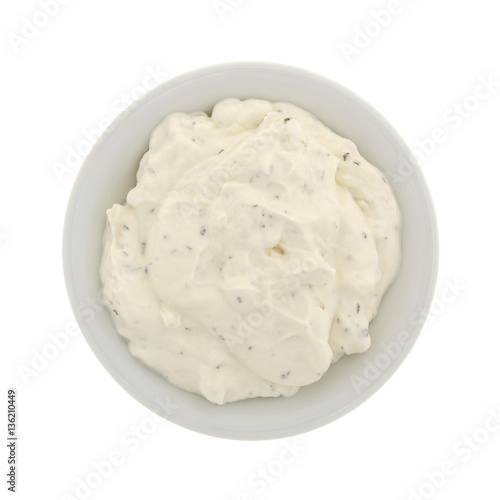 Fototapeta Naklejka Na Ścianę i Meble -  Top view of  a small bowl of French onion dip isolated on a white background.