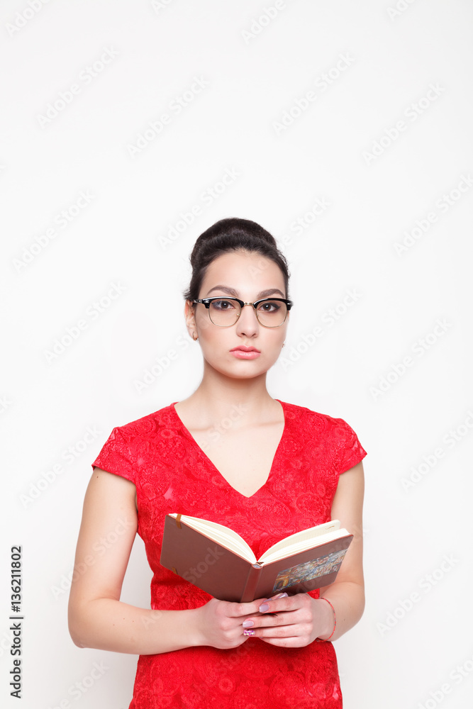 Woman with open book (notebook) on a white background Woman with open book (notebook) on a white background
