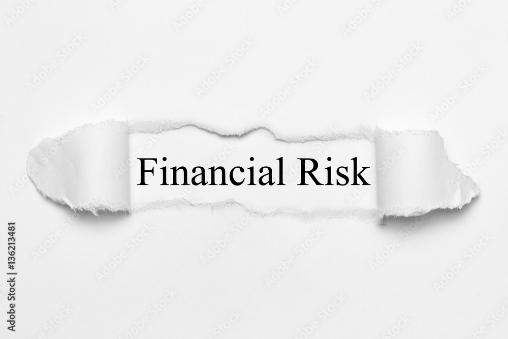 Fototapeta premium Financial Risk on white torn paper