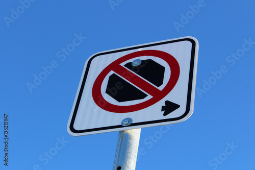 No Stopping Right of Sign Against Blue Sky © Amelia