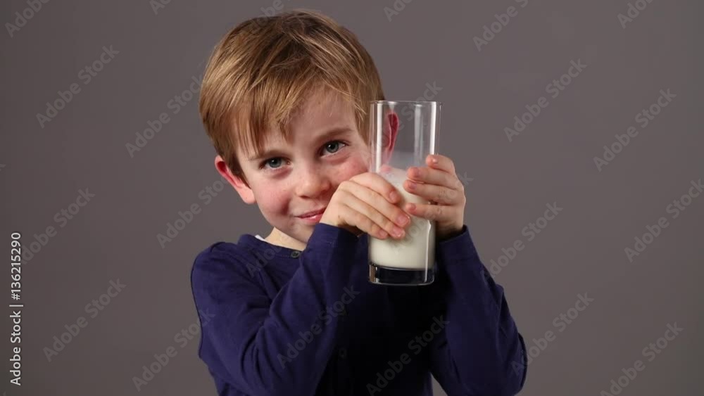 thrilled little child cuddling, holding yummy milk with baby memories thrilled little child cuddling, holding yummy milk with baby memories