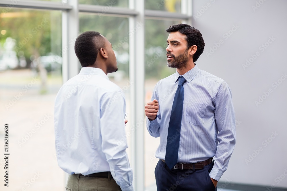 Business executives having an interaction Business executives having an interaction