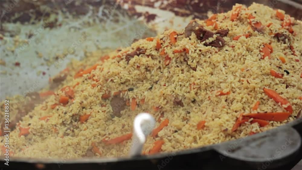 Tajik Rice Pilaf (Plov) preparation Afghan, Uzbek Tajik national cuisine main dish ...