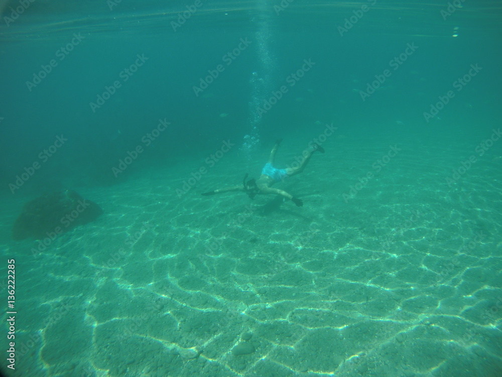 Snorkel en aguas cristalinas en los Acantilados de Maro-Cero Gordo (Nerja), Andalucia.