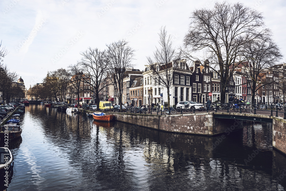 Amsterdam canal bridge and houses