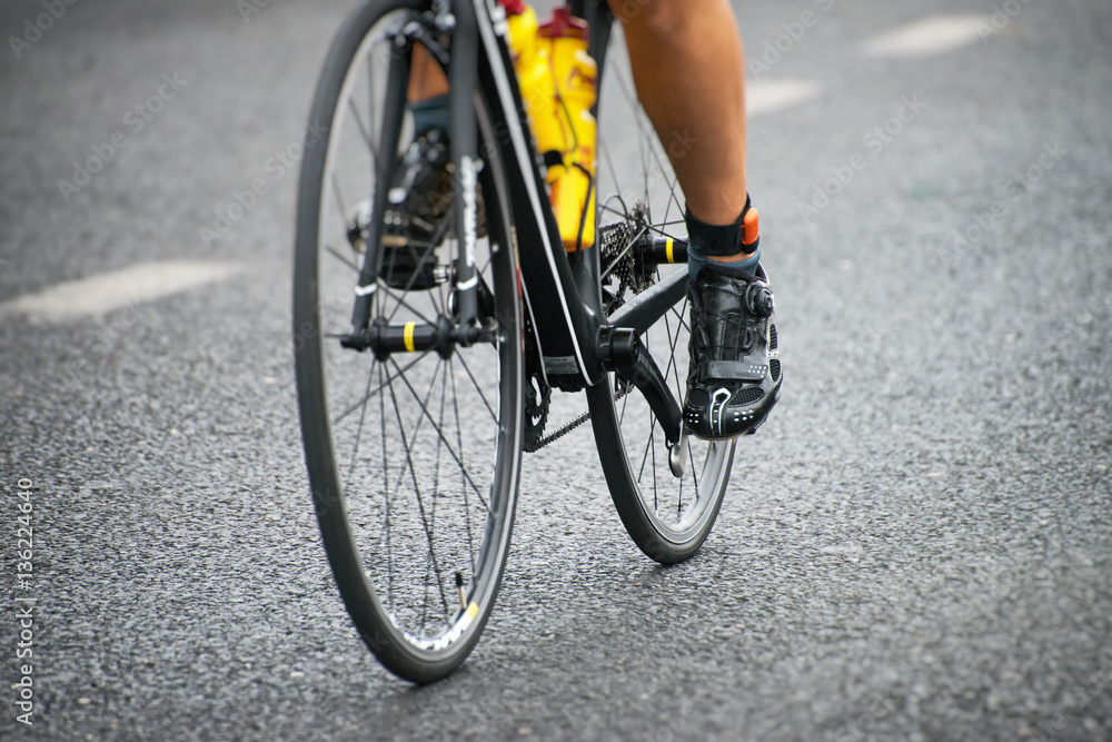 Naklejka premium Unrecognizable professional cyclist during the bicycle competition.