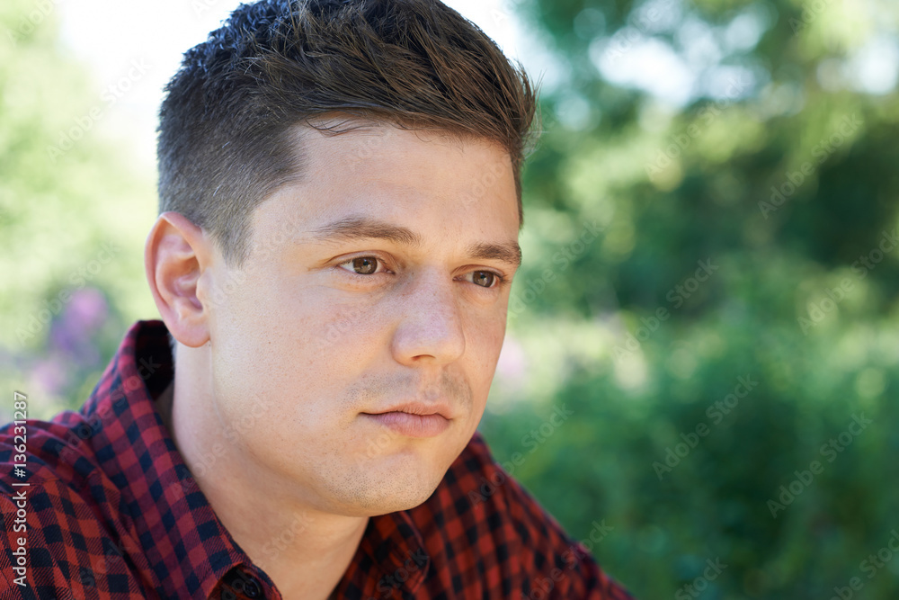 Head And Shoulders Outdoor Portrait Of Concerned Man Head And Shoulders Outdoor Portrait Of Concerned Man