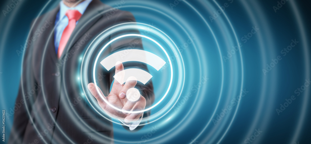 Fototapeta premium Businessman using free wifi hotspot interface 3D rendering