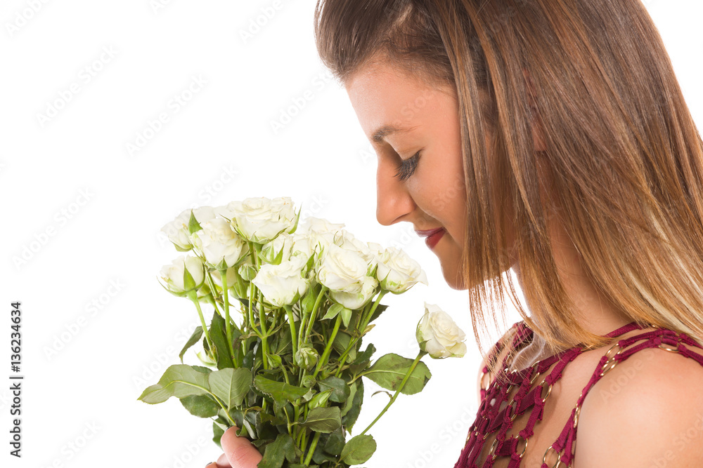 young girl smell bouquet white roses with long hair in burgundy young girl smell bouquet white roses with long hair in burgundy