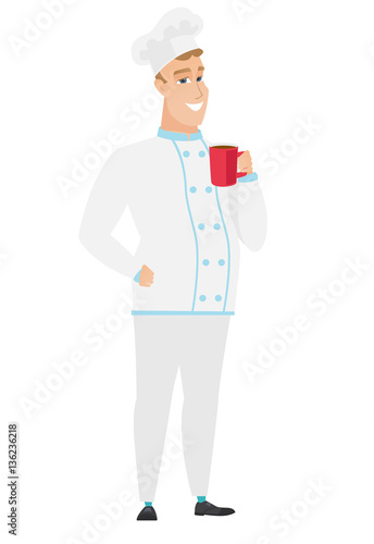 Young caucasian chef cook holding cup of coffee.