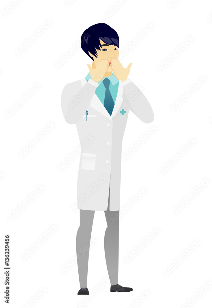 Shoked asian doctor covering his mouth. Shoked asian doctor covering his mouth.
