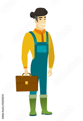 Asian farmer holding briefcase.