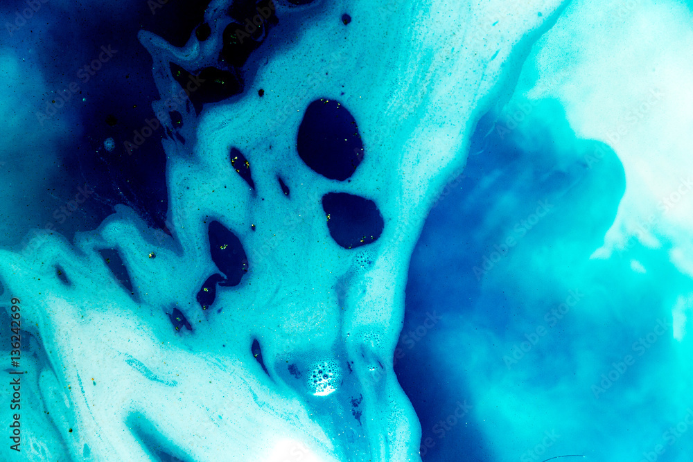 abstract background of ink dissolving in wate