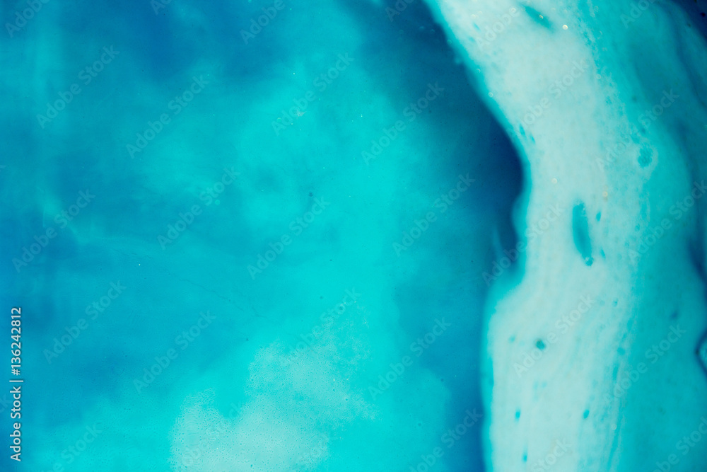 abstract background of ink dissolving in wate