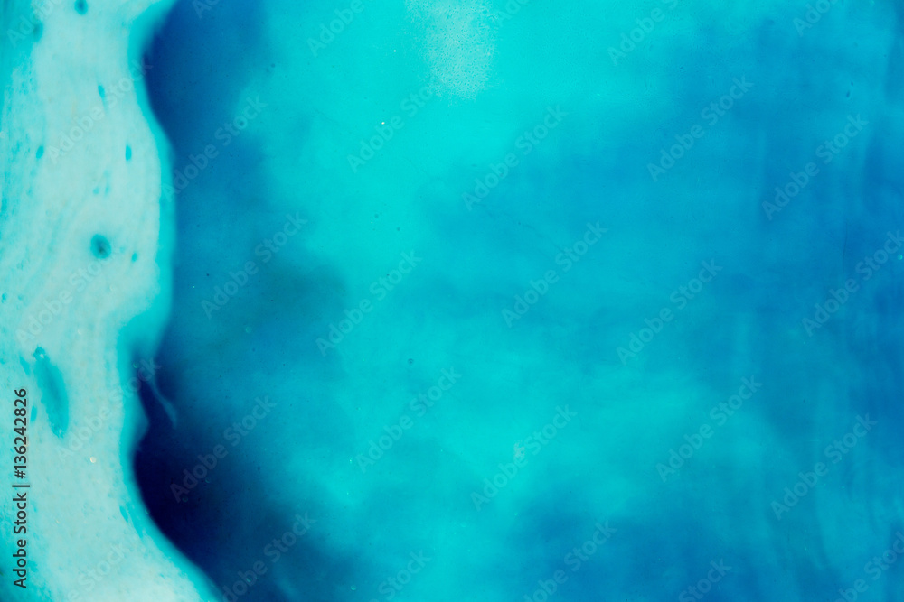 abstract background of ink dissolving in wate