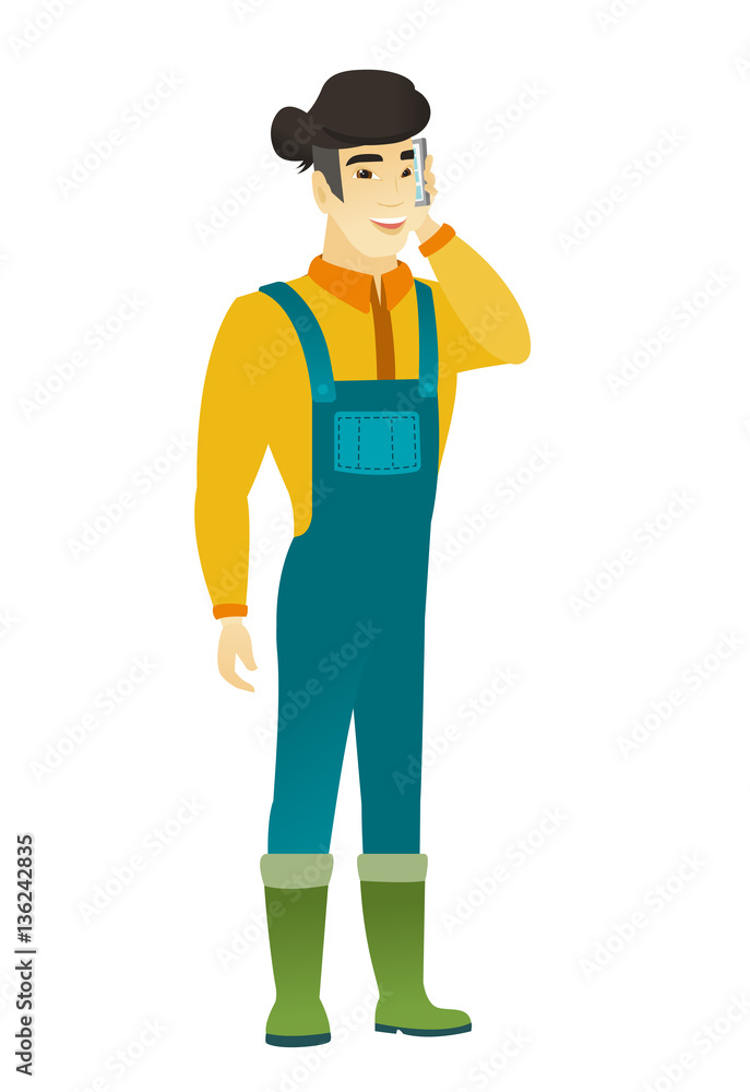 Farmer talking on a mobile phone. Farmer talking on a mobile phone.