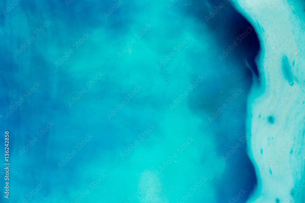 abstract background of ink dissolving in wate