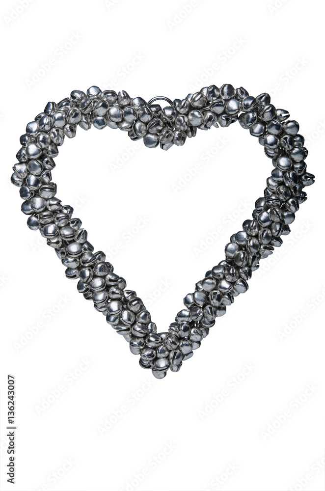 Decoration in the shape of heart isolated on white. Made of silv Decoration in the shape of heart isolated on white. Made of silv
