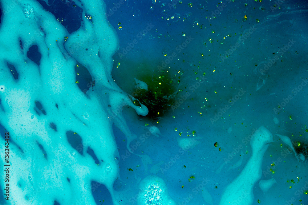 abstract background of ink dissolving in wate