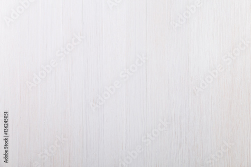 White wood background. Painted scraped wooden board. Bright texture or pattern.