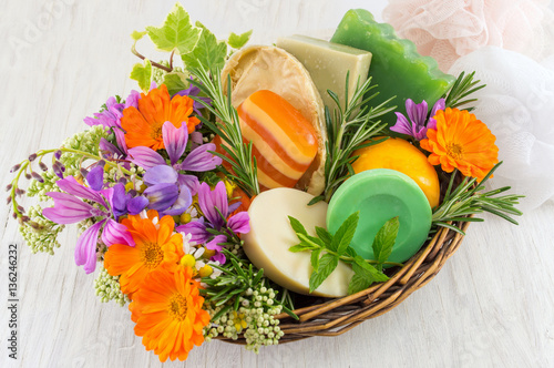 Herbal soaps and fresh spring flowers