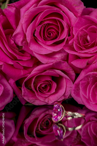 Pink roses and a ring of the same color