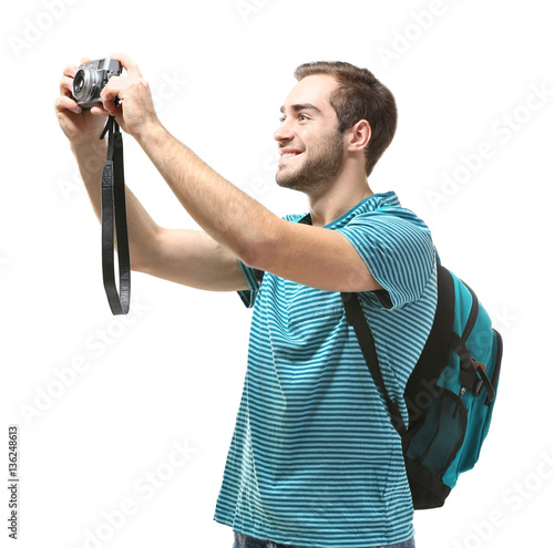 Man traveler with camera on...