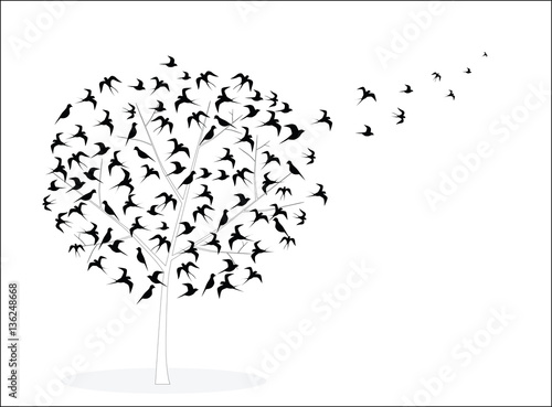 Vector picture with tree crown in the form of birds, some of which flies away