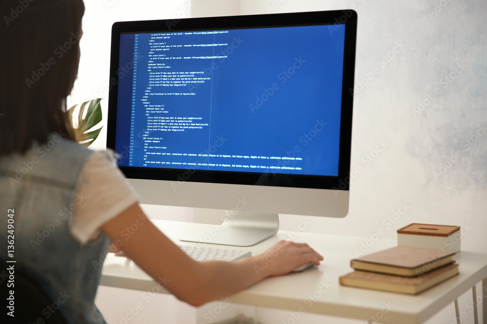 Woman working on computer at home Woman working on computer at home