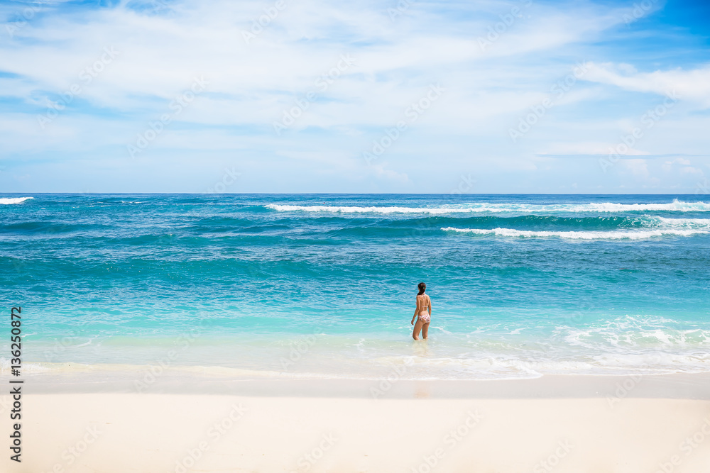 Tropical beach, ocean. Woman on the beach background. Vacation at Paradise. Ocean beach relax, travel.