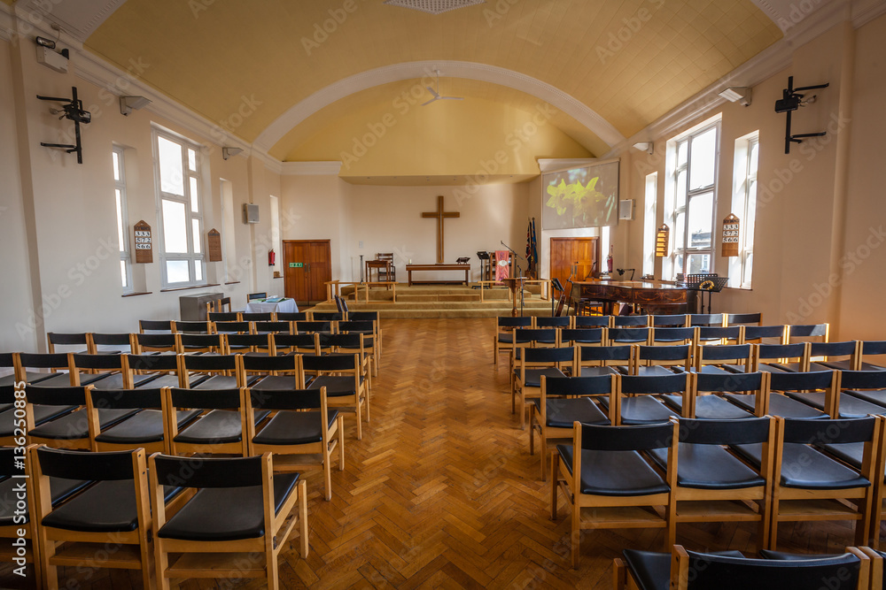 Empty chairs in the church