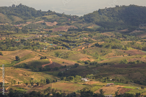 View over a valley from the top of a hill