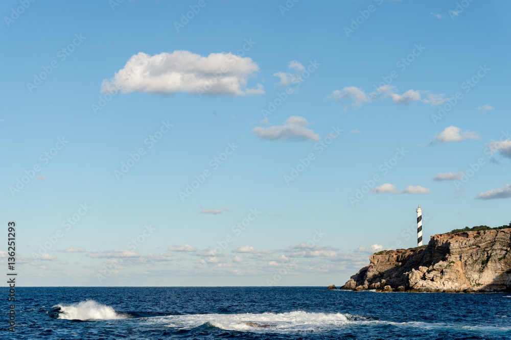 Lighthouse in the cliffs of Ibiza Lighthouse in the cliffs of Ibiza