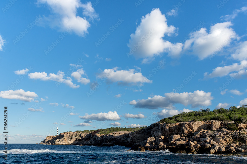 Lighthouse in the cliffs of Ibiza Lighthouse in the cliffs of Ibiza