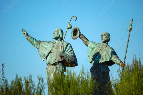 Leinwand Poster Statue of Pilgrims in the outskirts of Santiago de Compostela in Galicia, Spain