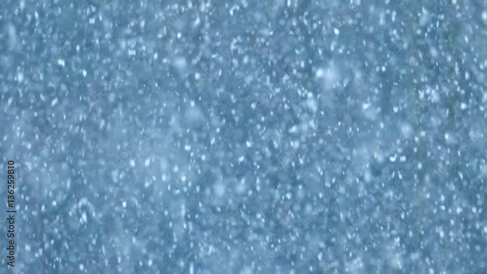Slow motion snow falling, relaxing nature background. This snow is falling at 1/30th normal speed, recorded at 900fps for a super-slow motion seamless loop. Slow motion snow falling, relaxing nature background. This snow is falling at 1/30th normal speed, recorded at 900fps for a super-slow motion seamless loop.