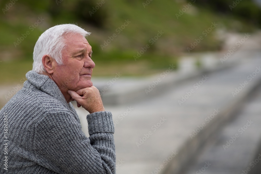 Senior man sitting on the steps Senior man sitting on the steps