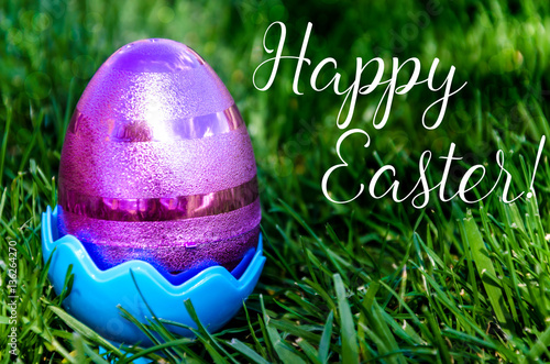 Easter eggs on the grass background photo