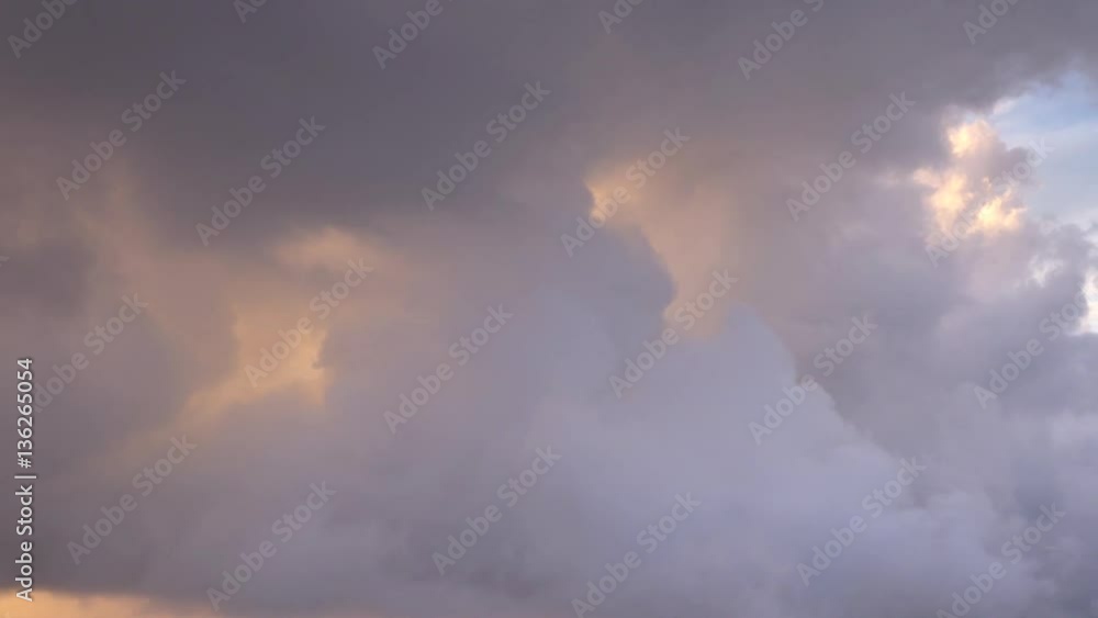 Aerial sunset behind clouds, Rays, Golden light Aerial sunset behind clouds, Rays, Golden light