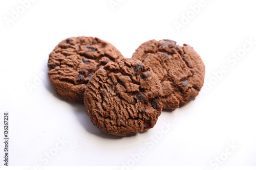 soft dark chocolate brownie cookies isolated on white background.